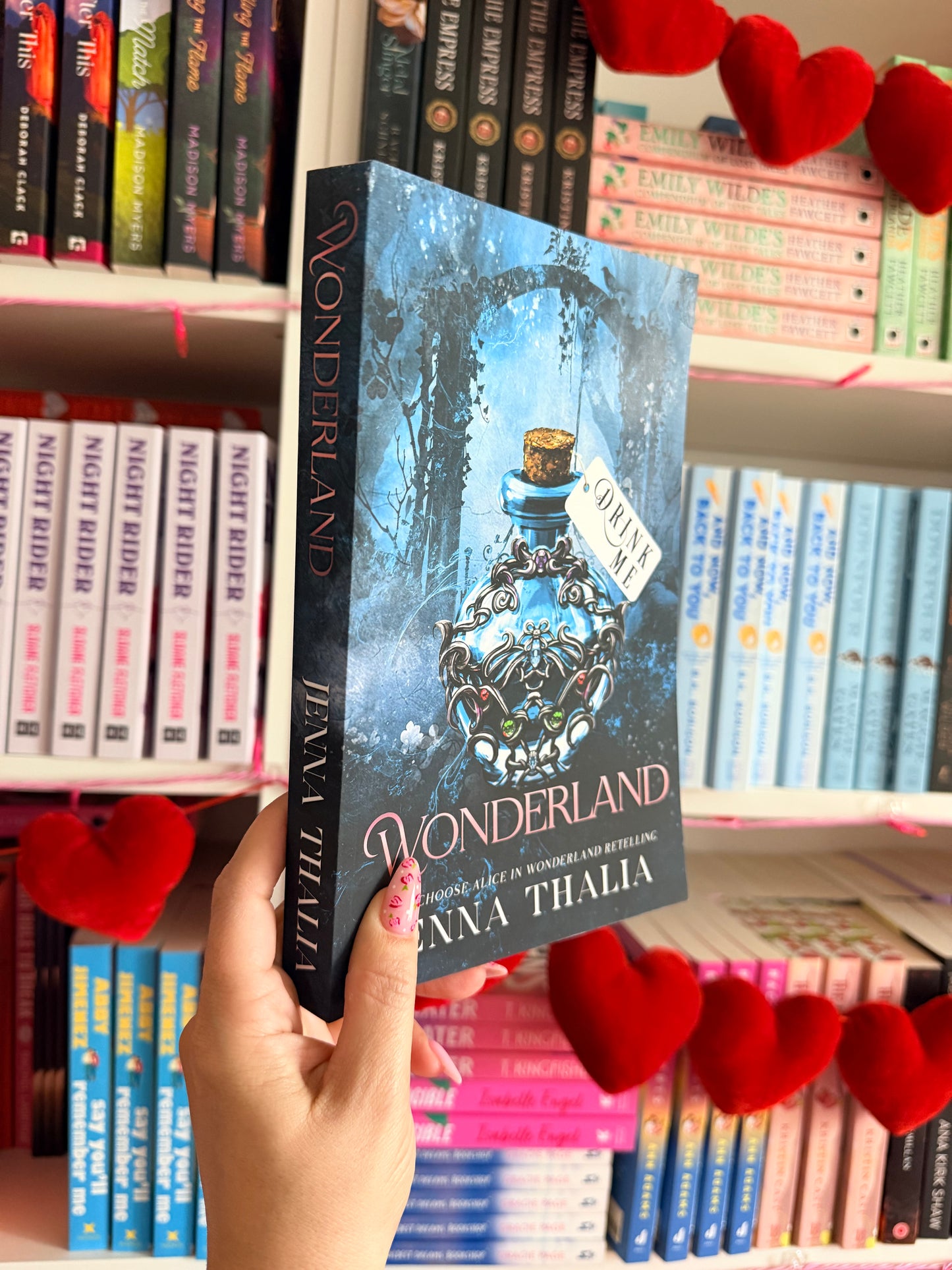 Wonderland: A Why Choose Alice in Wonderland Retelling