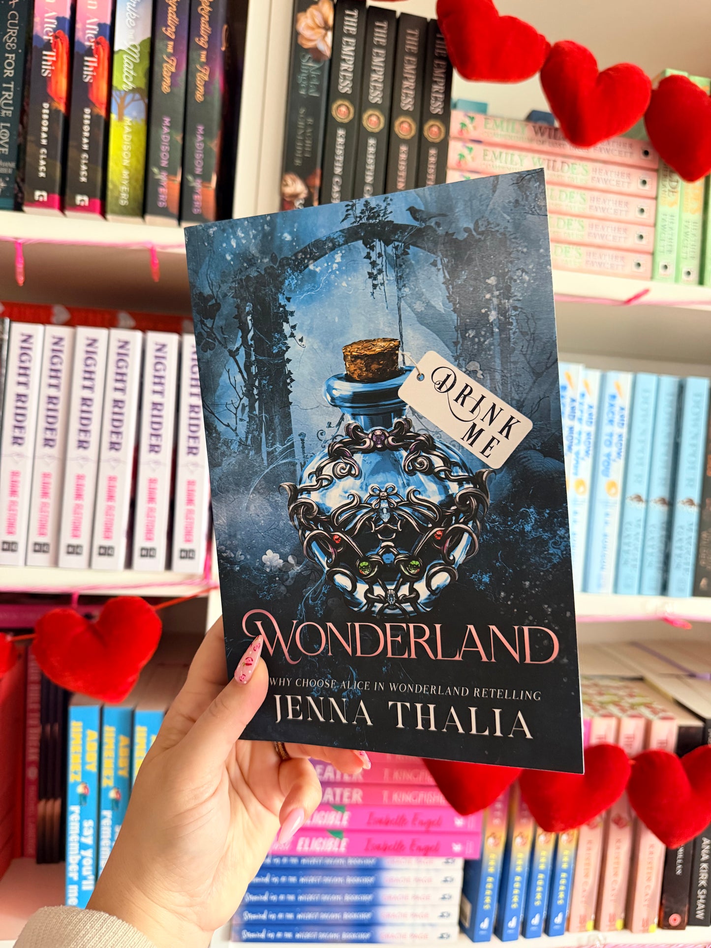 Wonderland: A Why Choose Alice in Wonderland Retelling